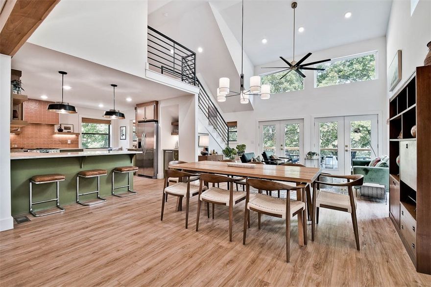 COMPLETELY RENOVATED LAKEFRONT AIRBNB WITH AN ADDITIONAL BUILDABLE LOT AND A 2 SLIP PRIVATE BOAT DOCK! Equipped with 10' X 24' slips, boat lifts, and a swim deck with ladder. This property is the ultimate Beaver Lake retreat. Boasting a 1.08 acre double lot, this home is perfect for those who love to entertain and embrace the beauty of nature. 4 bedrooms plus loft. Home features high ceilings and expansive windows, creating a warm and inviting atmosphere. New high-end finishes throughout! Step outside to enjoy the breathtaking views from the wrap-around deck, where the beauty of the lake truly comes to life. Gentle walk to the dock. Paved roads to the home and only a 20 minute drive to Rogers, offers lake living at its finest! This is a very lucrative Airbnb with frequent and consistent bookings. Furnishings and boats are negotiable.