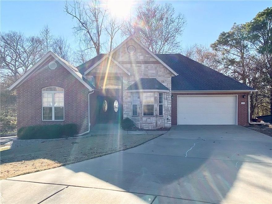 Spacious 3-bedroom, 2.5-bath Bentonville rental offering approximately 2,590 sq ft with a flexible layout and low-maintenance living. This home features two large living areas, an open kitchen, hardwood floors, a flex space ideal for an office or dining area, and a main-level primary bedroom. Two additional bedrooms are located on the lower level, along with ample extra storage space and functionality. Enjoy double decks, an attached garage, washer/dryer hookups, and a huge walk-in storage room/workshop. Conveniently located near Coler Mountain Bike Preserve, downtown Bentonville, shopping, dining, and the Walmart campus. Rent includes lawn treatment, mowing service, and pest control. All appliances are included except the washer and dryer. Tenant is responsible for utilities. Minimum 12-month lease; longer terms preferred. Pets allowed with restrictions.