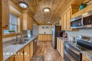 Looking for a like new, country home on acreage? This is it! Gorgeous, 3 BR/ 2 BA home resting on 1.17 acres in the Bergman School District! Features include; new luxury flooring throughout, new roof in 2021, huge kitchen island, granite countertops, pine wood ceiling accents, split bedroom floor plan, 2 car garage, stainless appliance package, walk-in closets, large pantry and utility room, crown molding, huge front porch, back deck and exterior solar lighting surrounding the entire home built into the eaves. This home is like new and shows very well! 20 minutes to Bull Shoals Lake and 15 minutes to Harrison.