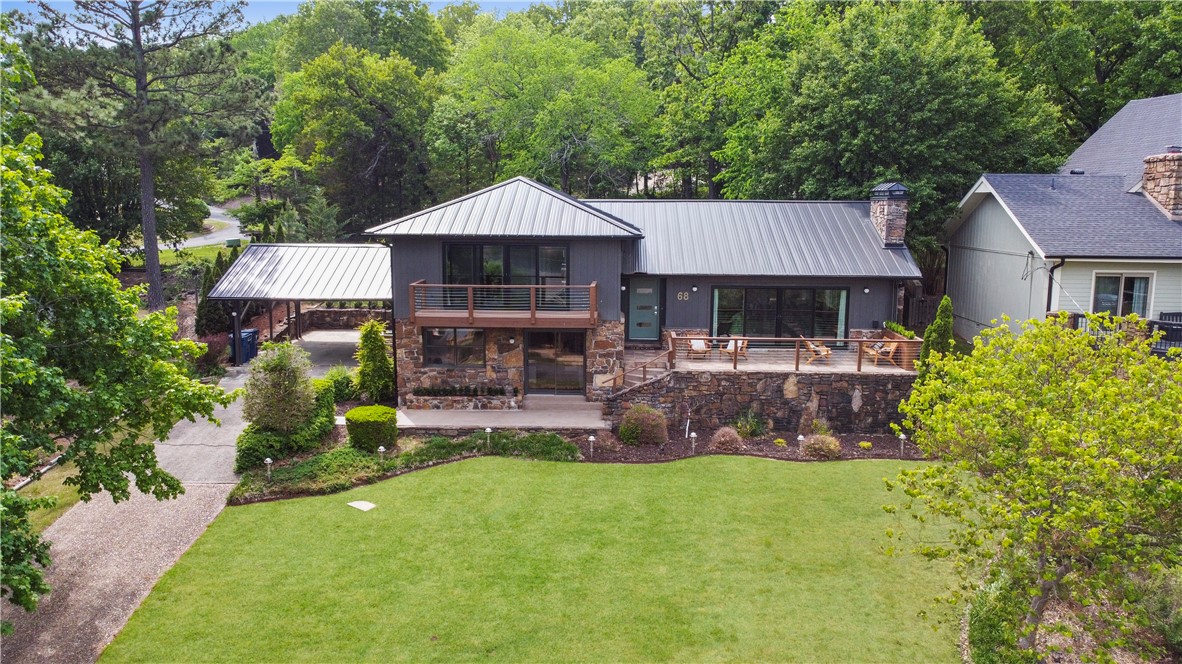 This awesome home offers round lake views of Lake Windsor! Mid Century Modern split level floor plan with 3 sets of sliding doors that access patios. This beautifully remodeled home offers 4 bedrooms, 3 bathrooms, and a flex space to use however fits your needs. Schedule your showing asap! This home is what everyone has been waiting for!