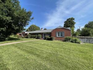 Brick exterior home located on a corner lot. This 3 bedroom, 2 bath, 2 car garage home is a single level. Updated kitchen, hardwood floors, 2 fireplaces. One located in the living room and the other in the dining room. Screened in patio would be the perfect place to enjoy your morning coffee.