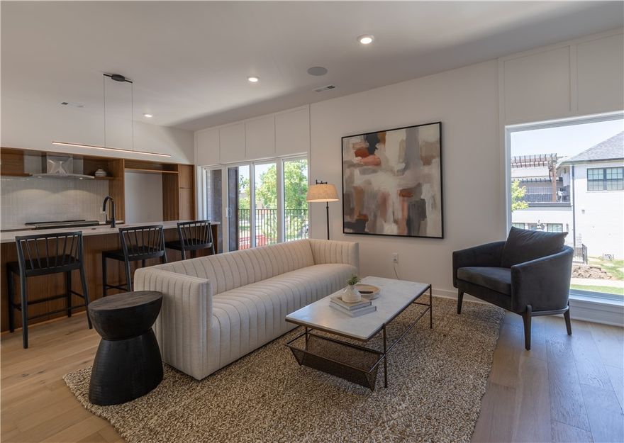 Exquisite 2 bedroom 2.5 bathroom condo with a bonus room in the heart of downtown Bentonville! Walking distance from The Momentary, Bentonville Square, Crystal Bridges, future Walmart Campus, and local favorites. Condo features custom built walnut kitchen cabinets, quartz countertops, Sonos speakers, and oversized windows flooded with natural light. Thoughtfully designed open concept floor plan with construction scheduled to finish early September.