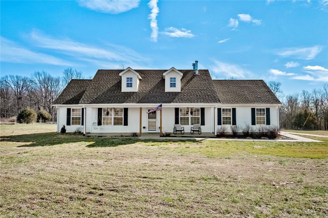 Beautiful country living with this home! Situated on 5 acres partially wooded in the back. Large living areas, wood stove, 2 shower heads in master bath & storm shelter. The 400 SF bonus room could be a 4th bedroom or game room. Only 1 mile from Lincoln Lake. RV port w/ 30 amp electrical.