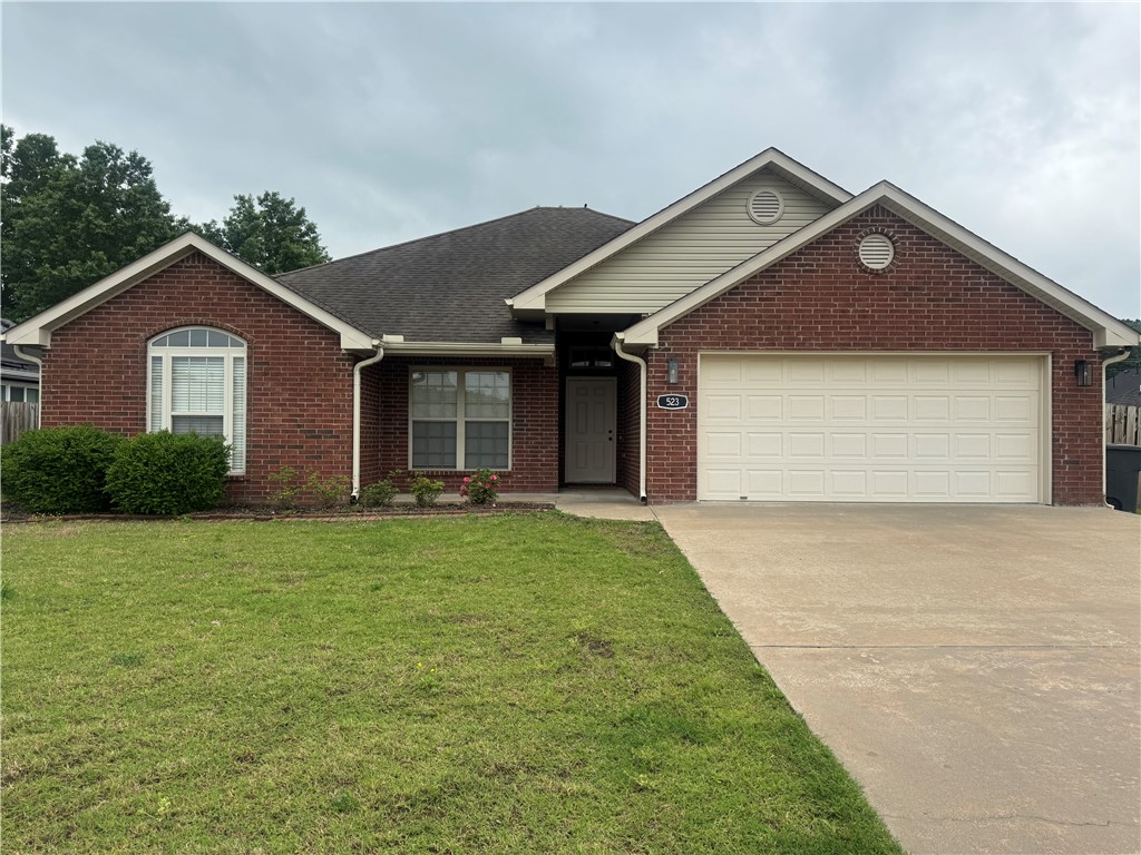 Summer is coming and so are high electric bills. !!!Solar panels !!! are a great bonus for this home to help with utility expenses. The back yard is Huge large enough for a swimming pool addition or storage buildings and fully fenced for privacy. This home has a split floor plan with 4 bedrooms, large living room with gas log fireplace, 10 ft ceilings, all new LED lighting , door hardware, paint, flooring. It features a tray ceiling in primary bedroom , vaulted ceiling in front secondary bedroom. Minutes from UofA