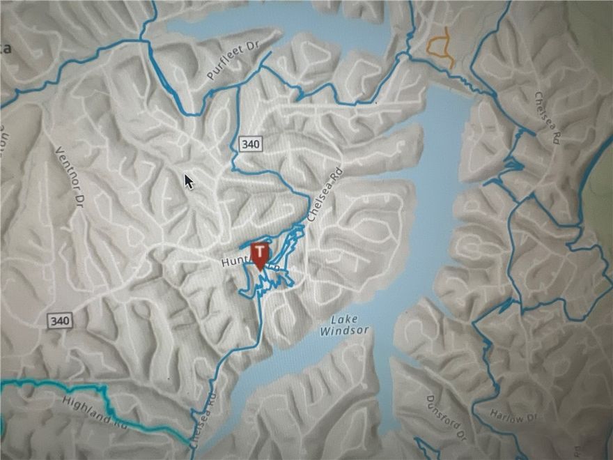 Up Hill Both Ways crosses the street in less than 600 ft and Huntley Gravity Park Trailhead less than 1/3 of a mile away!  Snuggled in between Lake Windsor and Lake Avalon, this large lot is a score. Trails in the
immediate area include: Up Hill Both Ways, Huntley Gravity Park, Lago Vista, Tunnel Vision and Tanyard Creek Park's walking trail and waterfall! Windsor is BVs 2nd largest lake and motorboat friendly! +220 acres, Windsor offers the best Lake Life! Skiing, tubing, wake boarding are allowed in the center. Coves & shorelines for canoes, kayaks and fishing. Due to the deep limestone walls of the lake Windsor is an
angler’s dream. Windsor has multiple parks and provide annually leased mooring. Amenities include a boat ramps, docsk, fish cleaning stations, pavilions, fishing piers, shoreline bank-fishing, picnic tables and grills. Enjoy Recreation & Resort Living at its finest and in the Mt Bike Capital of the World!