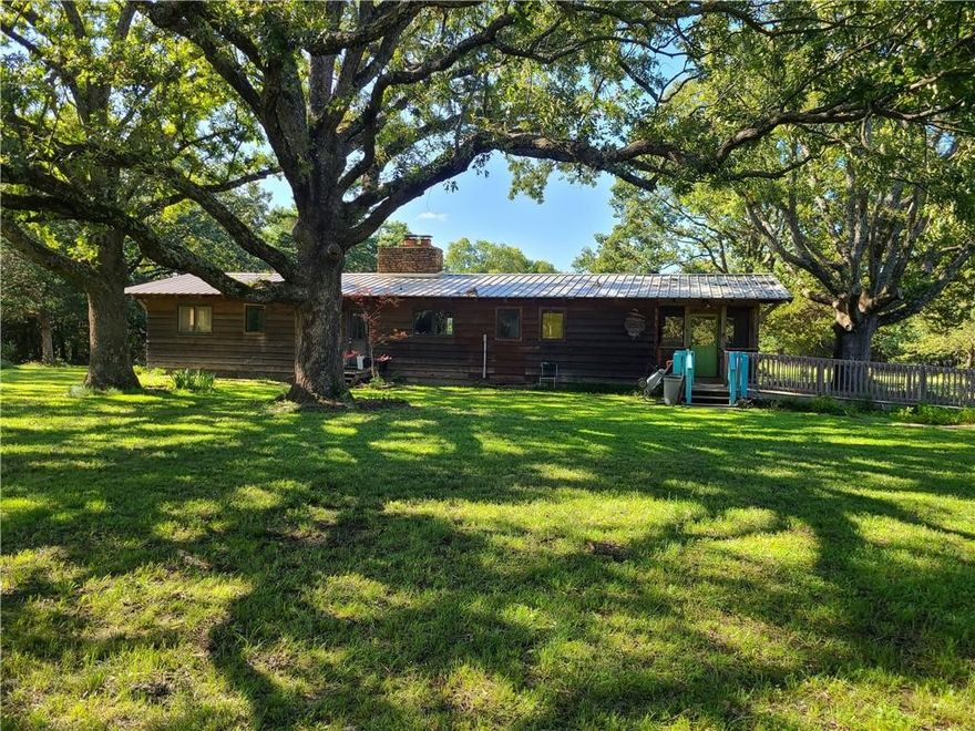 This 120-acre property on Blue Springs Road in Goshen, AR, presents a premier residential opportunity driven by its strategic location and desirable natural features. The gently rolling, mostly timbered land, which includes approximately ten cleared acres, offers an ideal canvas for an executive or high-end residential estate. The presence of Beaver lake nearby with boat ramps and access enhances property location.  Furthermore, the property's convenient twenty-minute drive to the employment and cultural centers of Fayetteville and Springdale ensures strong demand for future investment potential, making this a highly attractive property with many options in the near future.