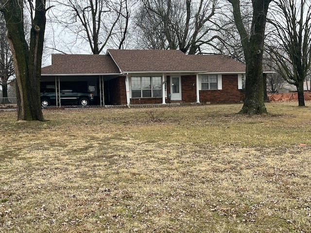Well-maintained brick home on a large corner lot close to schools and shopping. Some original hardwood floors. Fully fenced back yard with beautiful mature hardwoods and detached storage building.