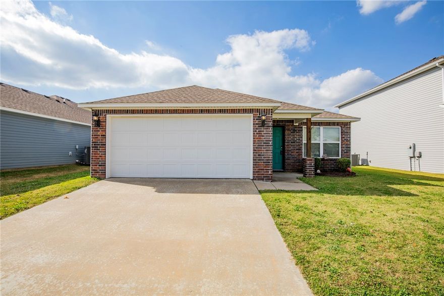 Here's an exceptionally located home just 4 miles the U of A campus and directly butting up to the trail system. This makes for a perfect home for someone wanting to downsize, begin their home ownership journey, have a place to live in your college years, or have a turn key rental for an investor. Low maintenance fence back yard too! Open kitchen to living room floor plan. Hard surface flooring in living, halls, kitchen, and bathrooms. Don't delay, book your showing today!