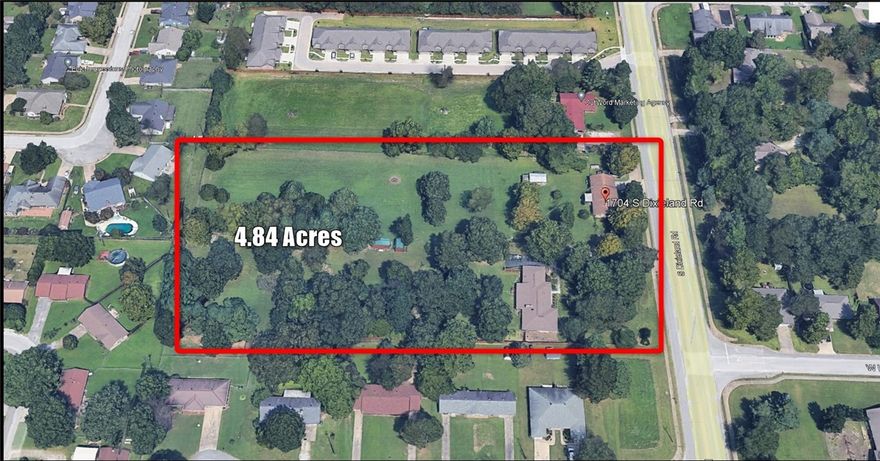 Prime Development Opportunity in Midtown Rogers! This exceptional 4.84-acre, two-parcel property offers a park-like setting with significant potential.  Situated on high traffic S Dixieland Road, the property features two livable houses, but the true value lies in the land.  All city utilities and high-speed internet, including fiber optics, are available on-site. Enjoy quick and easy access to Interstate 49, Pinnacle Hills Promenade, and both Uptown and Downtown Rogers.  With a daily traffic count of 15,000 vehicles (Arkansas DOT 2023), this location is perfect for your next development project. Homes sold AS-IS. Aslo listed as land/cross property MLS#1314626