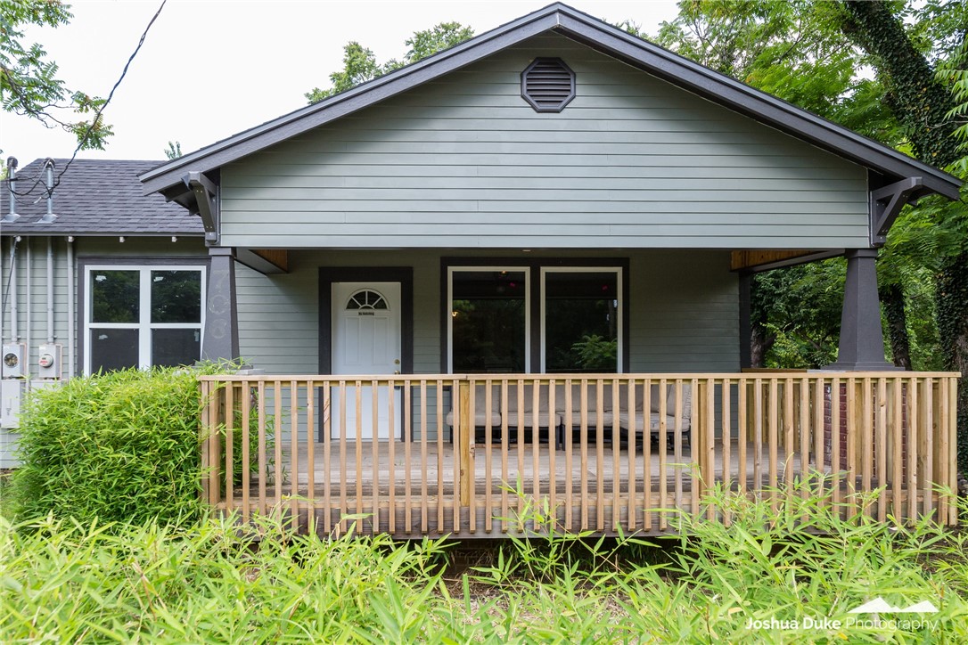 Quaint Craftsman Bungalow style home/duplex w/bonus cabin near U of A! Price is an "as is" price. Duplex & separate cabin! All new drywall throughout w/added insulation in all walls. New windows, new doors, new privacy fence, rebuilt front porch, all new electrical & PEX plumbing Front unit is rentable now & has remodeled bath & kitchen with unique, colorful tile. Back unit already has brand new custom solid maple cabinets! Property sold "as is" has 396 sf, full bath (you can hook to house for water - already hooked to sewer), some new masonite siding, rebuilt framing, wood heat, covered front porch & new windows like the house. Lots of potential, and you cannot beat the location for rentals! Also listed as Multi-family. See MLS#1188720