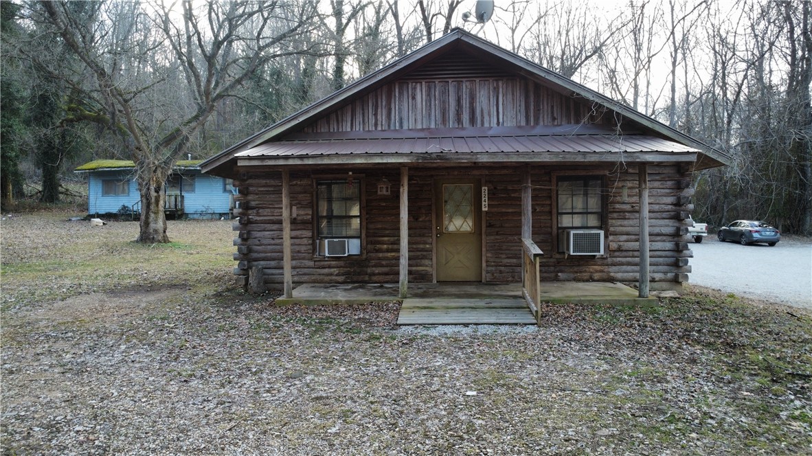 Rare opportunity in Historic Jasper, Arkansas! This property is zoned commercial as well as residential. This log home is Approx 740 main sq ft - 1 bed, 1 bath with an additional 19x18 unfinished space behind. Sitting on a half acre +/- positioned along HWY 7 this location would be ideal for a variety of businesses. Close to the Buffalo National River/Ozark National Forest and centrally located to everything this beautiful area has to offer. Additional photos coming soon.