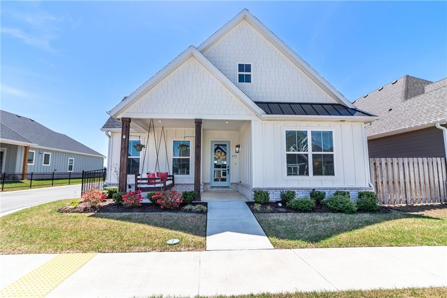 This stunning single-level residence features 3 spacious bedrooms, 2 full baths, and a thoughtfully designed open layout that blends comfort and functionality. With quartz counters, tons of storage, natural light, pantry, real wood floors, cathedral ceilings, fireplace, mudroom, and 2 covered porches this home has all of the features you desire. Located adjacent to Shaw Park, you’ll enjoy easy access to green space and walking trails—perfect for outdoor lovers. The rear-load two-car garage adds curb appeal and convenience, while the home’s interior shines with pride of ownership and attention to detail. From the moment you walk in, you’ll notice the upgrades and better-than-new condition throughout. Whether you’re looking to downsize or settle into your forever home, this gem offers a rare opportunity in one of Northwest Arkansas' most desirable neighborhoods. Don’t miss your chance to own this exceptional home—schedule your showing today!