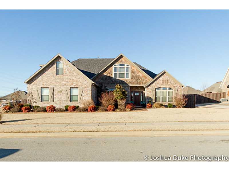 Absolutely stunning home now available in Bentonville, featuring a large, open floor plan and an AWESOME outdoor living area in a quiet neighborhood. 5th bedroom could be used as a bonus room. Master suite features vaulted ceilings with beam and a,spectacular master bath with walk in shower and spa tub. Formal dining makes entertaining a breeze. Hardwood floors in the main living area, plus granite in the kitchen and an island give this home high end finishes for a wonderful price!