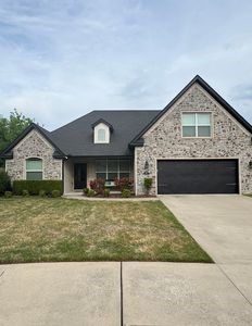 This beautiful property is situated in a quiet subdivision, close to schools, parks and trails, and Lake Fayetteville. Although located in a neighborhood convenient to both Springdale and Fayetteville, there is a large field directly behind the yard giving the perfect balance of convenience and seclusion.
Enjoy the open-concept living, kitchen, and dining areas, perfect for entertaining or spending quality time. In addition, the private office provides a quiet workspace. The kitchen is equipped with updated, stainless steel appliances, ample storage, and a breakfast nook. The home features four bedrooms and three full bathrooms. The primary suite has an ensuite bathroom, with a spacious shower and jacuzzi tub for relaxing. The backyard is a private oasis, complete with a deck and plenty of space for outdoor activities.
Within the past year, there have been numerous upgrades to the home including upsizing the A/C, as well as the kitchen appliances. The roof was replaced in July 2025.
