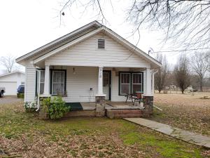 This property is loaded with potential! 6 acres in the Havana city limits, 3 separate sewer and water hook ups, and highway frontage on Hwy 309 going to Mt Magazine. Yes, you can live in this nice 3 bedroom 2 bath home and have a business on Hwy 309. This property offers a newer garage/ shop for your cars and toys, and another building with concrete floors, water and electric. There are barns for horses and even a pond. To know all of the potential this property holds, you must set up a time to view it for your self.
