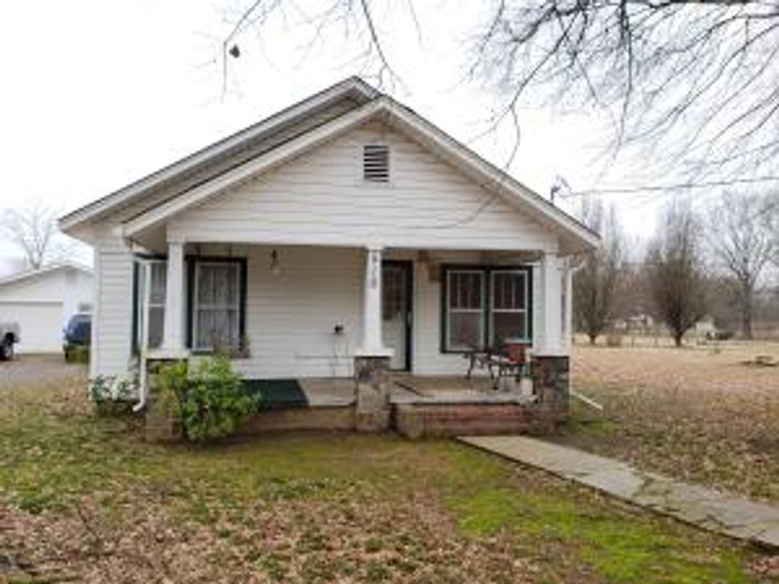This property is loaded with potential! 6 acres in the Havana city limits, 3 separate sewer and water hook ups, and highway frontage on Hwy 309 going to Mt Magazine. Yes, you can live in this nice 3 bedroom 2 bath home and have a business on Hwy 309. This property offers a newer garage/ shop for your cars and toys, and another building with concrete floors, water and electric. There are barns for horses and even a pond. To know all of the potential this property holds, you must set up a time to view it for your self.