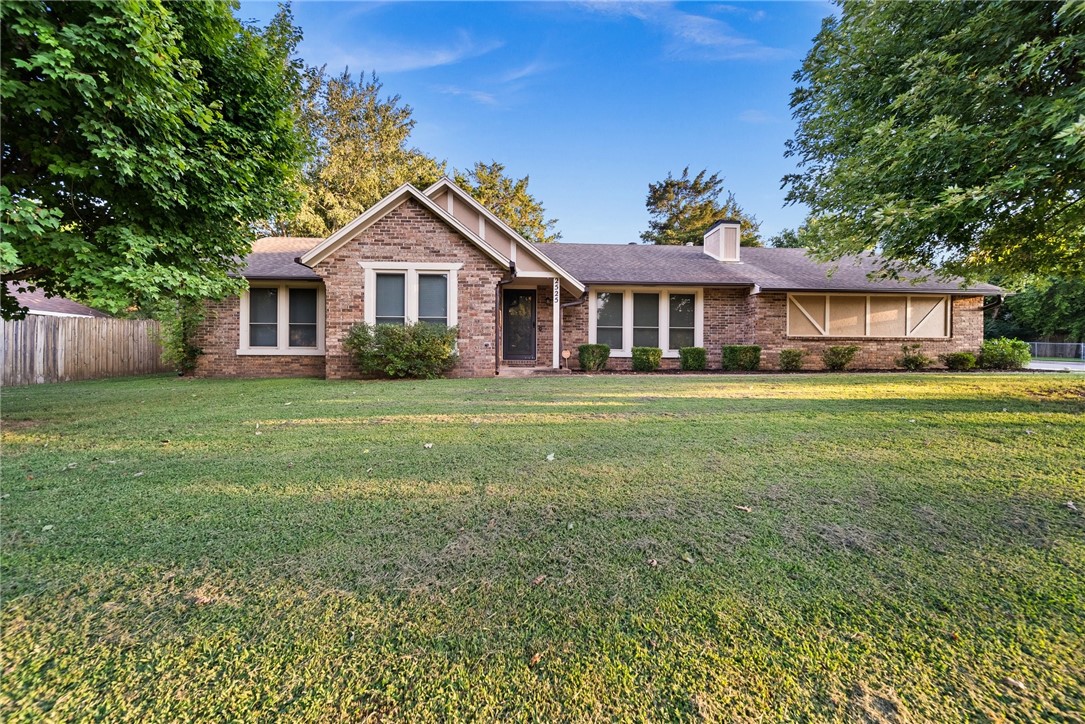 Welcome to this charming 1980s-style home located in the heart of East Fayetteville, just a couple of blocks from beautiful Gulley Park and Razorback Greenway trails. This cozy 3-bedroom, 2-bathroom home sits on a fantastic corner lot, surrounded by mature trees, offering both shade and privacy. With easy access to the business district, shopping, and more, you'll enjoy the perfect balance of quiet neighborhood living with the convenience of nearby amenities. Hanging out on the back patio or enjoying the sunroom, this home exudes character and warmth, making it an ideal retreat in a prime location.