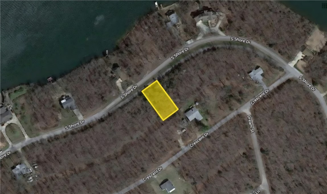 This .39 (+/-) acre lot is right across the street from Crown Lake and ready for you to build your new lake home. It is only minutes from Pioneer and Diamond Lake, along with local amenities. Mobile, manufactured or tiny homes are not allowed. Property conveys a Limited Warranty Deed. Owner financing available.