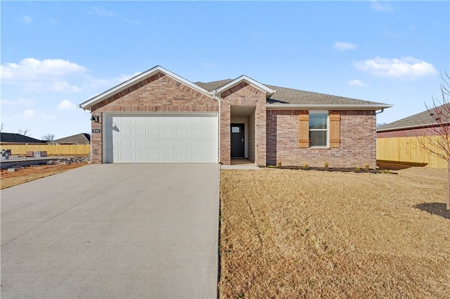 Be the first to live in this beautiful new construction home located in the Wagon Wheel Phase 2 neighborhood in Farmington! This modern home offers a spacious open layout with luxury finishes throughout. Features include durable LVP flooring in all main areas, wood shelving in all closets, pantry, and utility room, and a stylish kitchen with quartz countertops, 36-inch cabinets, and stainless steel appliances. The primary suite features double sinks, quartz counters, and an oversized walk-in shower. Additional perks include a 2 car garage, 4-sided brick exterior with Hardie® accents, and a thoughtfully designed floor plan perfect for comfortable everyday living. Washer/Dryer and refrigerator with ice maker in unit! Conveniently located near schools, shopping, and easy access to Fayetteville and I-49.