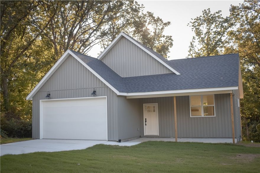 A beautiful new construction home in Bella Vista that offers 3 bedrooms and 2 bathrooms with a well-designed open floor plan. Features include high ceilings, quartz countertops, a walk-in closet in the primary suite, and a 2-car garage. Located on a quiet street with wooded backyard views, this home provides a peaceful setting while still being close to Bella Vista’s bike trails, golf courses, lakes, and community amenities. Modern finishes and natural light make the home both functional and welcoming. A pre-inspection has been completed, and a 1-year builder’s warranty is included. Up to $5,000 lender incentive available with preferred lender!