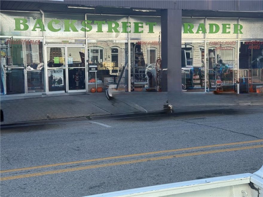 Here is your chance to own a part of Historic Downtown Harrison. Located on the Harrison Square this high visibility commercial property sits on one of the busiest streets in the area. Featuring expansive storefront windows that command presence perfect for attracting both foot and vehicle traffic. A nearby traffic signal naturally slows passing cars, providing ideal exposure. Whether you're launching a retail storefront, boutique, office, or showroom this location offers a unique opportunity to maximize visibility and customer engagement.