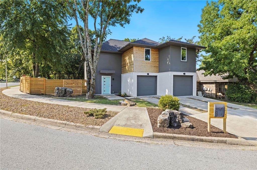 PreLeasing for June 2025. Step inside this award-winning modern partially furnished home, built in 2018 and celebrated in the Parade of Homes for its curb appeal. Located in the heart of Fayetteville, this property is walking distance to local eateries, the Razorback Greenway and The New School. The home is a certified Net-Zero design, combining style with sustainability. Enjoy advanced energy efficiency with features including a 6.3 kW solar system, a solar water heating system, and extensive foam insulation in the roofline and exterior walls. Apply at PrimeNWA.com
