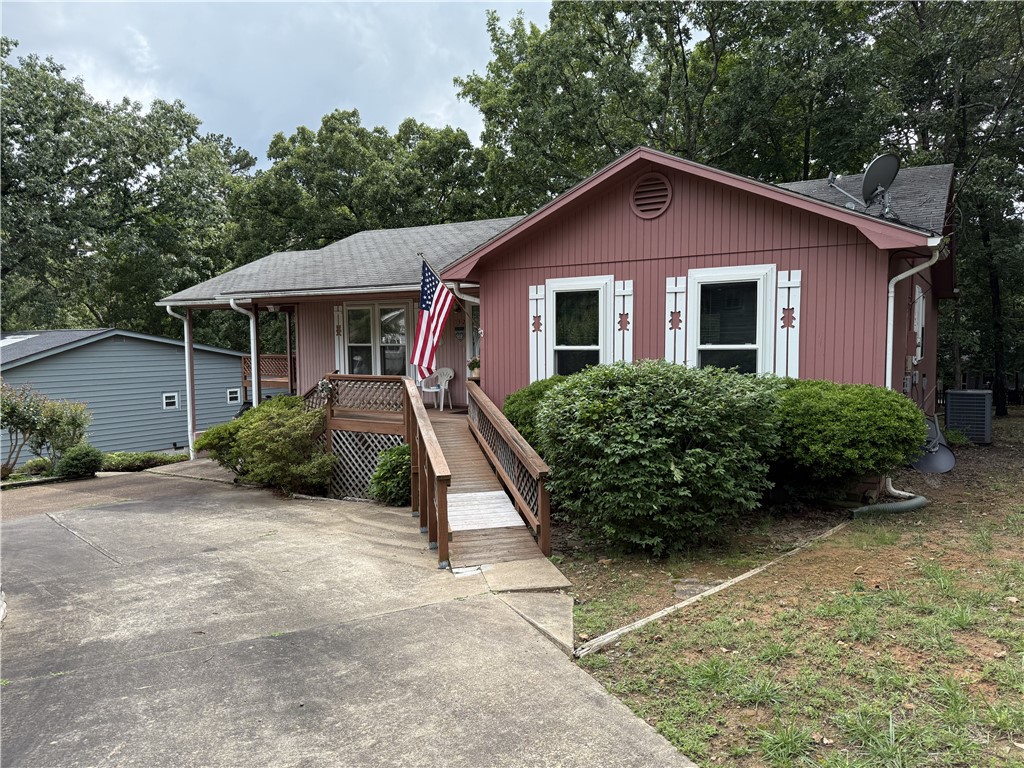 Welcome to this 4 bedroom, 2 bath home offering 1,816 sq ft of living space in the desirable lake community of Fairfield Bay near Greers Ferry Lake. This property features a 1-car carport, convenient circle drive, and a spacious layout perfect for full-time living or a weekend retreat. The basement includes a workshop with outside access only, along with additional storage space. Fairfield Bay offers golf, pools, mini golf, hiking and biking trails, 90+ miles of ATV trails, and the top-rated Fairfield Bay Marina on Greers Ferry Lake. Great opportunity to live near the lake!