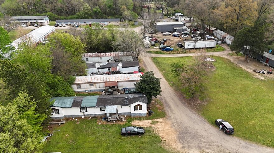 Located just off Sparks Rd, this property features four mobile homes on one site, offering excellent potential for rental income or multi-family living. Tucked in a quiet, more private setting while still being just minutes from town, this is a rare chance to own an income-producing property in a convenient location. Whether you’re looking to expand your investment portfolio or create a flexible living setup, this property offers both versatility and value.