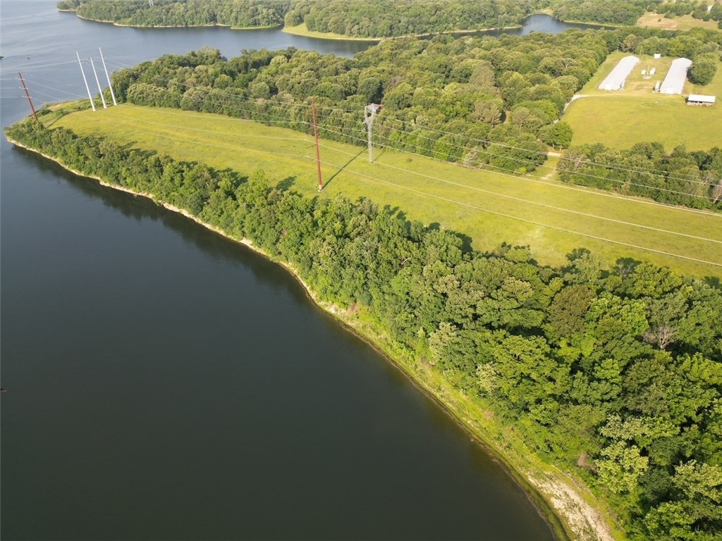 27+ Acres with incredible lake views. Partially wooded, lake front property with multiple building spots. Enjoy the privacy of your land and make your dreams come true.