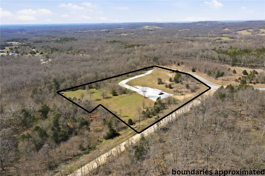 Rare opportunity to own 4.21 acres comprised of 9 adjacent lots in Posy Mountain Ranch offering exceptional flexibility for a private estate, family compound, or multiple build sites. This LEVEL, cleared acreage features paved road access, a gravel prepped driveway, and a 14'x30' outbuilding ideal for storage or a future water-well pump house. The property has all corners clearly marked (see photo), providing confidence and ease for future development. Located just minutes from Beaver Lake and Lost Bridge Marina, owners enjoy access to Lost Bridge Village amenities including a swimming pool, pickleball court, recreation center, private airstrip, and more. Covenants and restrictions do apply, including a minimum 1,500 sq ft build requirement. Well needed. Septic permit dated 11/2024.