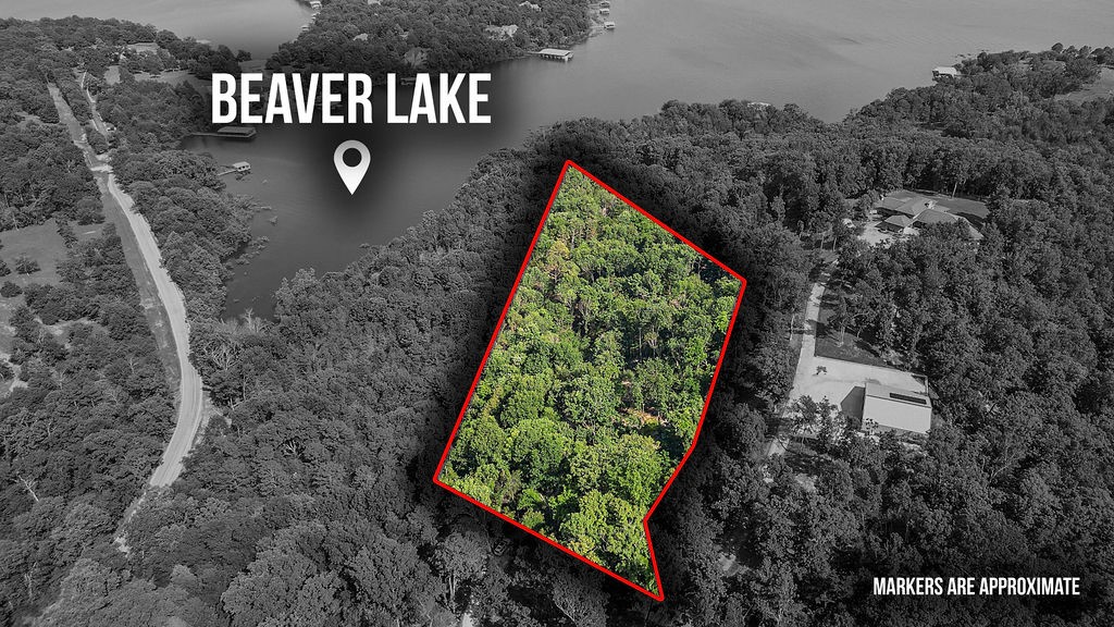 Escape to your own slice of paradise with this 5-acre wooded lake lot, tucked inside a quiet, gated community and complete with a boat slip on the community dock. Perfect for living the lake lifestyle you've been dreaming of. Set in a serene, natural setting, this lot offers plenty of space to relax, explore, or simply enjoy the quiet of nature. Whether you're looking to build now or invest in the future, this unique property combines space, privacy, and lake access in one incredible package. Opportunities like this don't come along often.