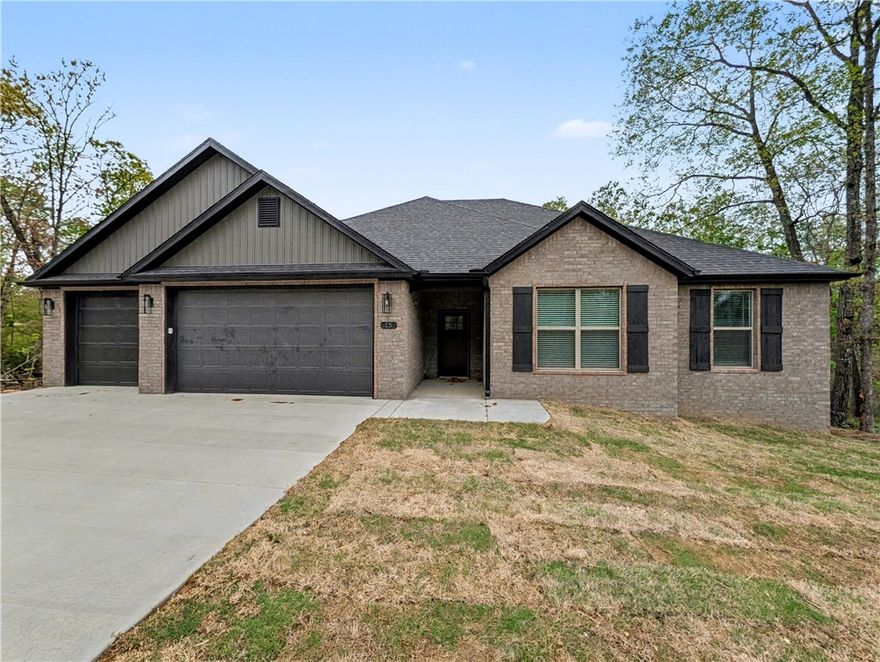 Welcome To Your Next Home! This One’s Got The Space, Style, And Bonus Garage You’ve Been Searching For! Currently, New Build WITH 3-Car GARAGE,  Smart Split Floor Plan With A Vaulted Living Room, Warm Beam Accents, And A Corner Gas Log Fireplace That Sets The Tone. The Kitchen Delivers With Custom Cabinets, Tile Backsplash, Pantry, Under-Cab Lighting, And An Island With Bar Seating Plus Eat-in Dining. The Primary Suite Includes A Full Custom Tile Shower, Dual Vanity, Potty Closet, And A Pass-Through Closet That Connects Straight To The Laundry...Convenience At Its Best. Two Secondary Bedrooms Share A Full Hall Bath. Covered Back Deck With Steps Down To The Backyard, Because That Just Makes Sense! Sodded Yard, Quiet Street, And A Prime Location With Quick Access To I-49, Highlands Golf & Pub, And Branchwood Trails. Background And Credit Check Required.
