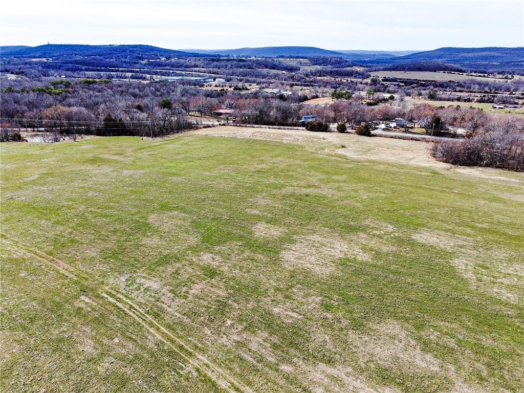 163 acre property in Greenland with private pond and scenic views of South Fayetteville. Napier Road Frontage. Existing 12" water main and gas line, sewer main within 100'. Close proximity to city luxuries with beautiful country surroundings. 5 minute drive to Drake Field and Fayetteville Country Club, or a quick 10 minute drive to Downtown Fayetteville and the University of Arkansas. Also listed in MLS 1228649.