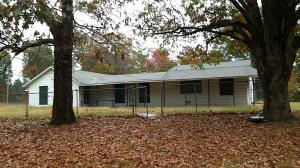 If you are looking for lots of room both inside and out, then this farmhouse is for you. There is approx 2 acres for you to have a garden, chickens, dogs and cats, inside there is room for your hobbies and enough elbow room that you won't be cramped for space. Home features 2 or 3 bedrooms, living area, kitchen, dining room, laundry room and more. Priced to sell.