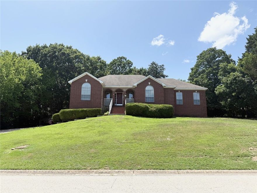 Don't miss out on this beautiful home in a fantastic location! Fully finished basement offers second living space and game room. There is lots of room in this 2,858 SF home. It features 4 bedrooms and 3 baths, a gas-log fireplace, beautiful wood laminate and ceramic tile flooring. The kitchen boasts granite, bright cabinetry, attractive backsplash, a bar that seats at least 4, plus a nice walk-in pantry. The primary bath has separate his/her vanities - very nice. Beautiful back deck to truly enjoy the outdoors has a covered area perfect for a grill and chairs to relax and entertain. Enjoy the spacious 0.36 AC yard with a privacy fence. Walk to trails and the neighborhood pool! Come and see this spacious home today!