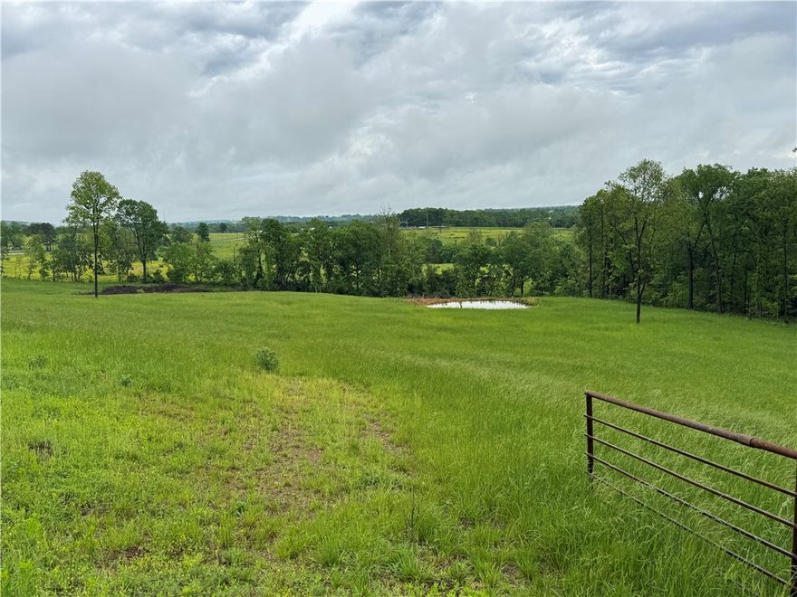 Great location just approx 20 minutee drive  to Rogers Arkansas 15 to Eureka Springs  15 to Huntsville Arkansas . This Beautiful 9 acres has great potential for a home site or weekend getaway close to Beaver lake and all Northwest Arkansas has to offfer.