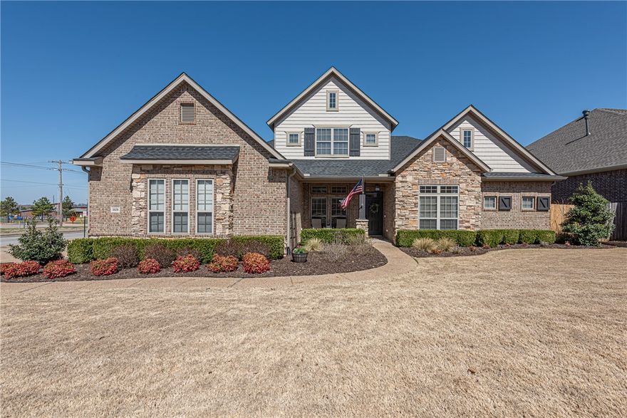 This 4 bedrm, 2.5 bath home offers convenient access to schools, mountain biking trails, Bentonville Community Center, & a short drive to I-49, Pinnacle Hills, & XNA. This well-maintained home has a covered front porch & inviting curb appeal. Inside, open-concept layout w/ a formal sitting rm or dining sits just off the entry & leads to a spacious living rm w/ wood floors, abundant natural light, & a fireplace. U-shaped kitchen offers workspace & storage w/ granite countertops, pantry, large island, breakfast dining, gas range, & new stainless steel apps (24'). Relax in the primary suite w/ dual vanities, jacuzzi tub, & separate shower. 3 addt'l bedrms & 1.5 bathrms on the main lvl. Upstairs, a versatile bonus rm offers space for media or hobbies. Enjoy outdoor living in the large covered patio w/ outdoor fireplace & TV capabilities. Spacious backyard w/ a new fence (26') & room to enjoy a variety of outdoor activities. ADDT’L FEAT: In-Ground Garage Storm Shelter, Irrigation System, New Roof (25’), New HVAC (24’)