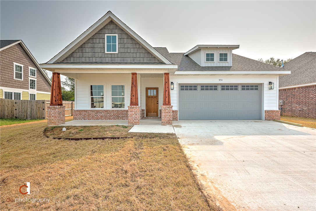 Beautiful new construction craftsman. Upgraded lighting Emporium light fixtures, landscaped and sodded. Gas logs, granite, built-ins. Large custom shower, open floor plan.