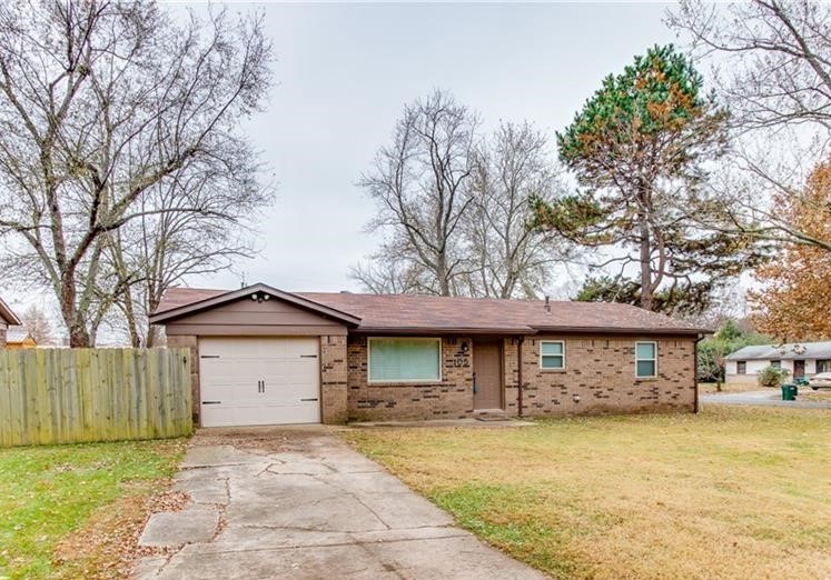 First time home buyers delight...all brick, gutters, large corner lot and newer windows. Roof is appx 10 years old. Gas range in kitchen, refrigerator conveys. One car garage. Large, fenced back yard. Side street is a dead-end street. It is a very quiet area. Convenient to schools, downtown West Fork and Hwy 71 B or Hwy 49.