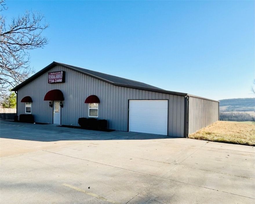 Now offering OWNER financing possible! Take a peek at this HIGH traffic area, just off Highway 412 Huntsville. This multiple zoned office space is just 1/2 a mile from Huntsville Wal-Mart. This 2000 sq foot building, plus attached 800 ft of garage contains 3 offices, one large meeting/conference room and 2 restrooms. Location is on point with 2 street frontages. The property is inside city limits and being dual use zone (DUZ can be used as commercial or residential) This building has ALL city utilities. 1/2 an acre MOL, new survey will be provided at closing.