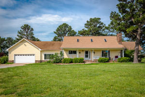 Beautiful farm with rolling hills in the Ozarks! Five bedrooms with an office/library that could be used for an additional bedroom. With 2800 plus square feet this home is ready to go! New improvements include; kitchen remodel, hardwood floors and carpet, high quality windows, roof and so much more! The beautiful rolling hills make for a breathtaking view. Among its many great features this property boasts a 6-stall horse barn with hay loft, pond, 2 car garage, basement and a golf driving range. Inside you'll find a floor to ceiling wood burning fireplace, cedar plank vaulted ceiling, 5 bedrooms, 3 bathrooms, kitchen, den, office, utility room and so much more. Wildlife is plentiful from the living room you can watch ''critters'' of all shapes and sizes. Pipe fencing and 3 large fields.