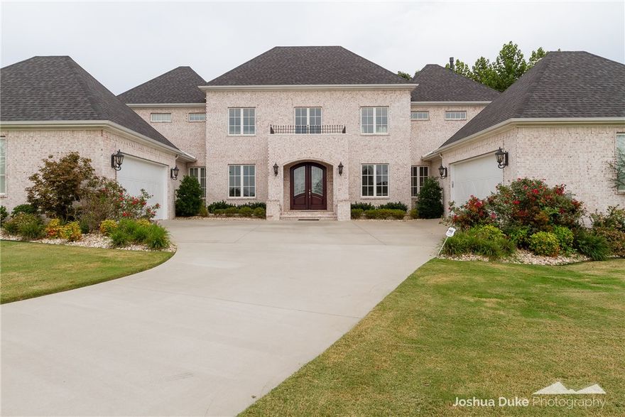 Beautiful estate property with high end amenities, featured in AY's Magazine, all bedrooms are suites, Master has sitting room and deck.  Designer kitchen, spacious covered porch, 1.15 acres.  Hardwood floors.  Located in the gated Blessings Golf Club Community.