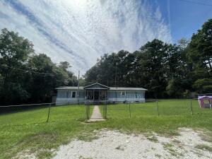 3 bedroom 2 bath mobile home on 2 acres with a newer roof and central heat and air and a carport. Yard is nicely fenced in with good privacy from the road! Real close to the Buffalo river.
