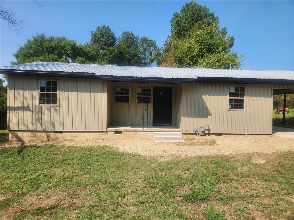 Looks like new! Nice 3 bed, 1 bath home in Hartman has tons of updates! New siding, new windows, new kitchen cabinets, new bath, new vinyl plank flooring, new range, new fridge, new dishwasher, new microwave! That's a lot of new at a great price! One car attached carport, nice yard. See this one today!!