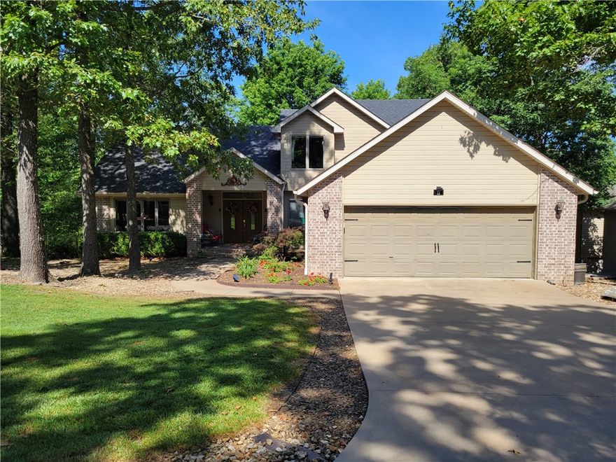 If You're looking for a beautiful home on one of Loc Lomonds' deep coves close to the wide water but with no wave action look no further. This large fun ready family home awaits you. The appealing combination of entertainment and grandeur Is so inviting. Inside is cool convenient and lovely, the game room, workout room, wet bar, and generous family rooms invite action or tranquility. Outside the 3  shaded decks offer dining, gaming, and lounging spaces. Then follow the paved path down to the boat dock and enjoy an exhilarating boat ride on the waters of Loch Lomond. See atached list of updated and amenies