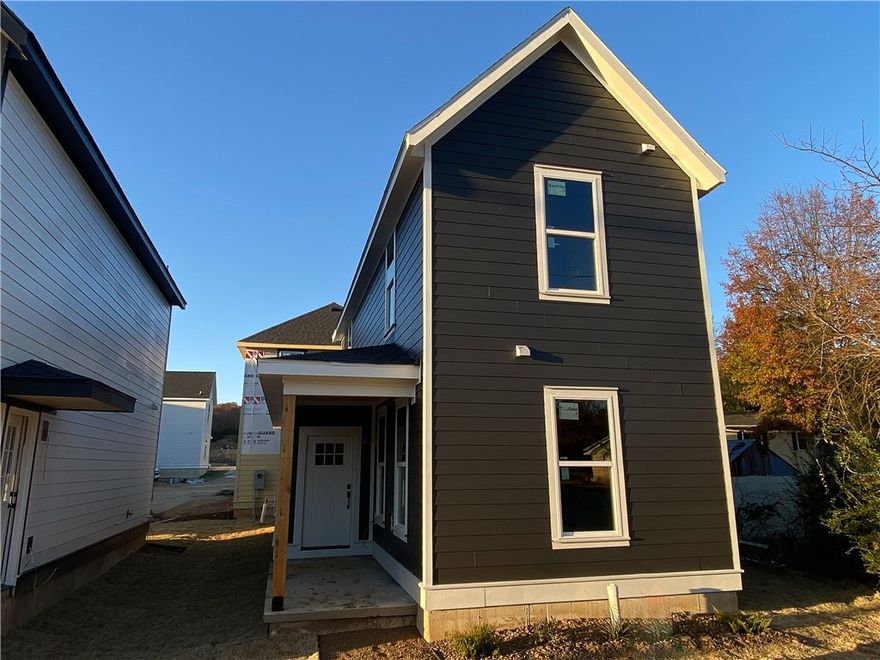 $3,500 LENDER CREDIT offered with buyer’s use of builder’s preferred lender - Use towards rate buydowns or closing costs! (OPEN HOUSES hosted @ MODEL HOME: 1015 N Laramie Heights) Welcome to Southern Woods! A Trailside Community at the base of Centennial Park 2022 Top Outdoor Facility Rating) Location offers access to miles of trails, greenspaces with paved pathways, & bicycle stalls, minutes away to shopping, food, I-49, & University of Arkansas! 3 BEDROOM DUPLE COTTAGE floor plan feat: a covered front porch w cedar posts, an open concept first floor w 9’ ceilings, LVP floors, & kitchen w 3cm granite counters, tiled backsplash, large center island w sink, stainless steel appliances! Main floor laundry, primary bedrm & ensuite! Upstairs 2 more Bedrms w private ensuites! POA $35/mo incl lawn mowing! Join
this community in a premier location today!