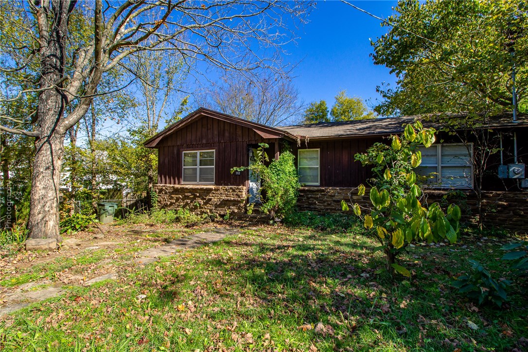 Fantastic redevelopment opportunity in South Fayetteville. Located across the street from Walker Park's disc golf course and just minutes from downtown/Dickson St., U of A, and I-49. Zoned NC and in the opportunity zone. House to be sold as-is with no repairs.