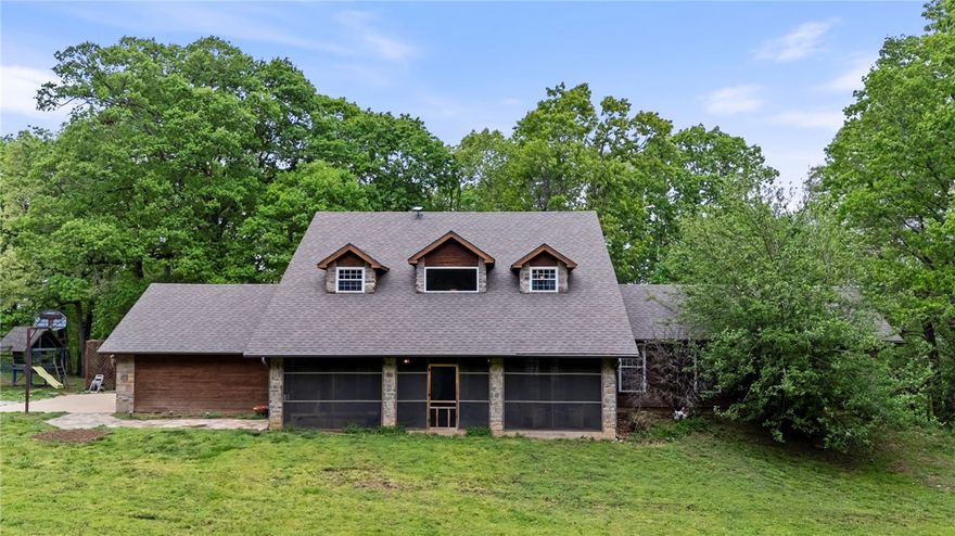 Charming and primed hobby farm on nearly 6 acres, ideal for goats, ducks, and chickens. This 3,970 sq ft home offers 5 bedrooms and 5 bathrooms with plenty of space for family or guests.

The property features beautiful mature trees, open areas for grazing, and room for coops and gardens—perfect for bringing your homesteading vision to life. Enjoy peaceful country living with a prime location—just 30 minutes to Rogers and Eureka Springs, 5 minutes to the lake, and 15 minutes to Hobbs State Park—giving you the best of Northwest Arkansas while still enjoying your own private oasis or use it as a vacation rental!