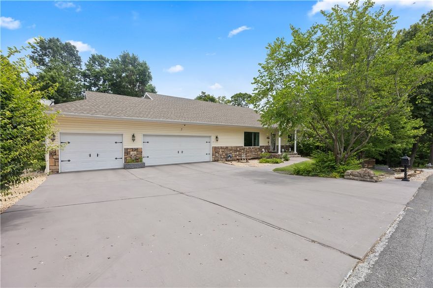 This home has it all! looking for all the extras? Look no further. Featuring 3 car oversized garage & a 3 car tandem garage basement level with easy access to for 6 GARAGE SPOTS TOTAL! 2 level lots for total of .78 acres, full 1 bedroom apartment with separate entrance, workshop in basement with 2 drains & has true RV parking with privacy fence. Builders do not build homes like this any longer with 2x6 framing for solid home & 2–1000-gallon septic tanks & real hardwood flooring, crown molding & double hung windows. Home features 3 bedroom & 3 bathrooms total with bonus/craft room could be 4th bedroom. New paint throughout the home as well as kitchen & bathroom cabinets. New hardware in kitchen, new lighting in dining room & living room. Enjoy summer with above ground pool. 20x18 back deck built to support hot tub/with 110 & 220 outlet. Must see to appreciate all this has to offer for a car collector, boat storage or storage for RV! Seller WILL entertain owner​​‌​​​​‌​‌​​​‌‌​​​‌‌‌​​‌​​‌‌​​​​ financing.