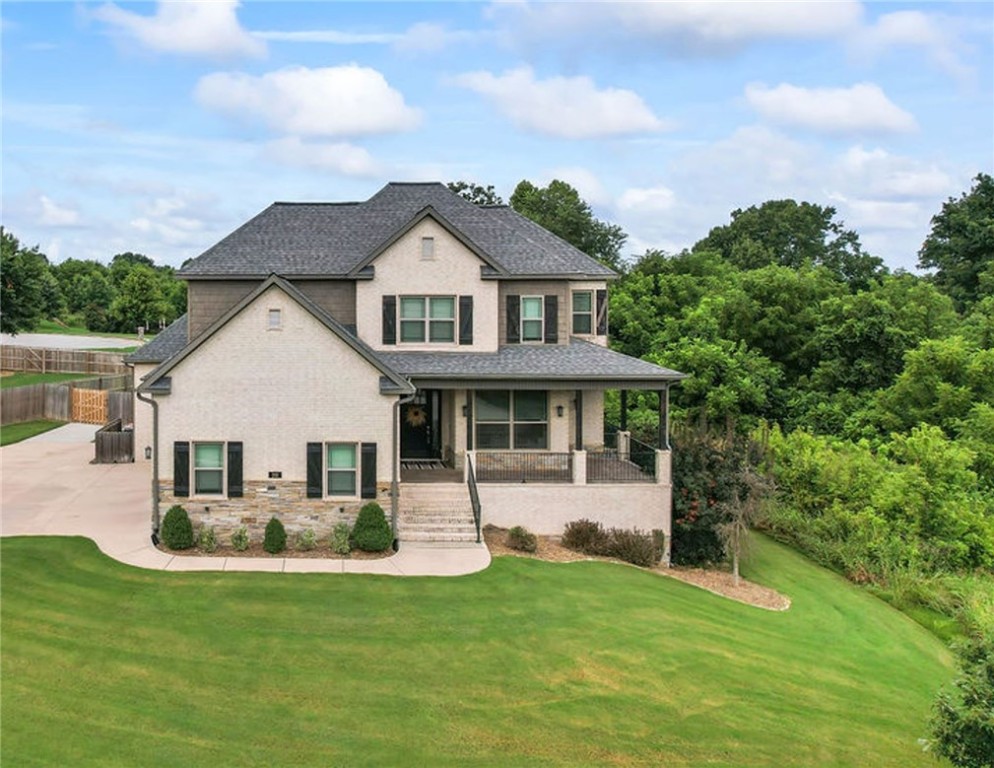 *$20,000 seller paid rate buy down! Welcome to Otter Creek Subdivision! This 4,085 sq ft custom-built home, completed in 2017 and meticulously maintained, rests on a serene half-acre lot for ultimate privacy. Featuring 5 bedrooms, 4 baths, and vaulted ceilings, it boasts high-quality granite countertops. The gourmet kitchen includes an island with bar seating, pantry, pot filler, wine fridge, microwave drawer, and double ovens. Outside, enjoy covered and uncovered decks in the backyard oasis. The main floor offers a luxurious primary suite and another bedroom/bath, with 2 bedrooms, bath, and attic storage upstairs. The basement features a second living area, full bathroom, wine cellar, and walk-out patio. Community amenities include walking paths, ponds, pool, sun deck, cabana, and basketball/tennis court. A 3-car garage with in-floor storm shelter and epoxy coating adds convenience. Don't miss this rare opportunity for luxury and functionality in a desirable neighborhood. *Seller offering $20,000 rate buy down!